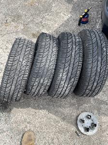 Letní pneu s ráfky na Škoda Felicia